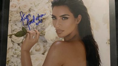 Photo of Kim Kardashian signs autograph with West in her name amid Kanye divorce.